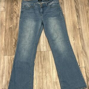 Women's Medium Blue Flared Jeans with Subtle Fade